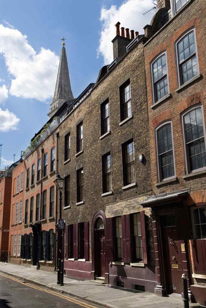 Spitalfields London Uk. Georgian town houses. Wilkes Street London EC1. Spitalfields Christ Church spire in background.