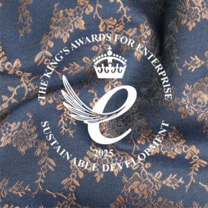 Woven fabric with kings award logo