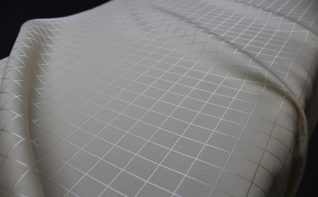 A silk and wool window pane check in pale grey